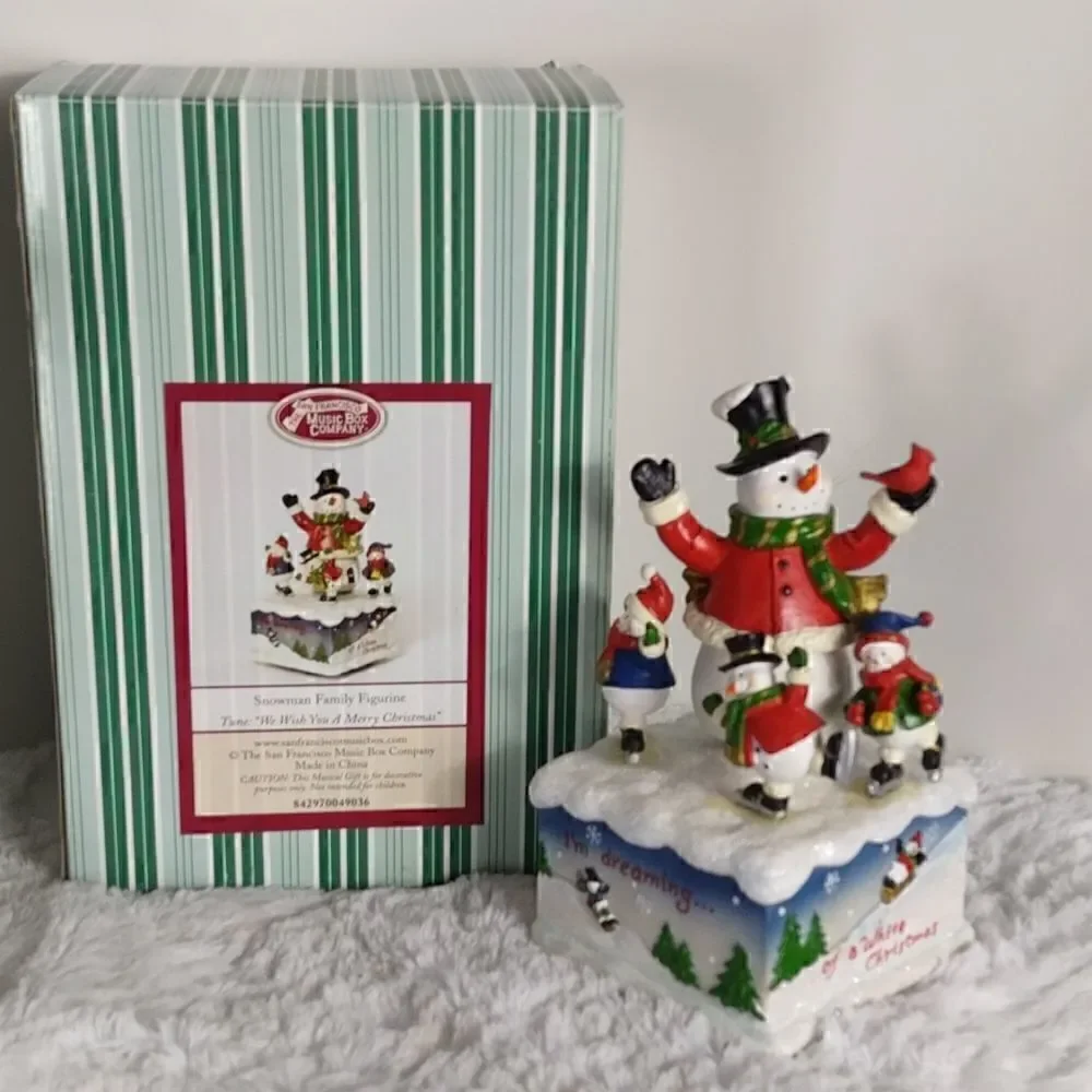 Musical Snowman Family Spinning Figurine